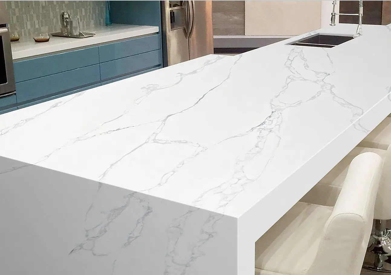 Close-up of a waterfall island edge in Calacatta 5011 quartz