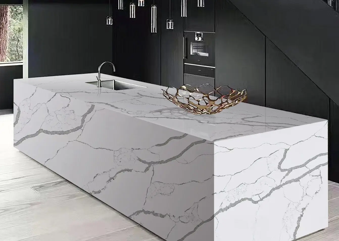 Waterfall kitchen island in Calacatta 8621 white quartz with bold gray veining