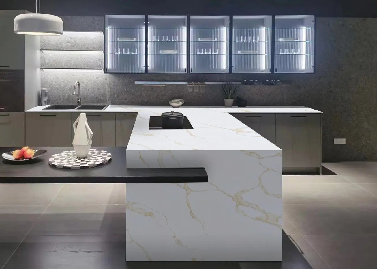 L-shaped kitchen island in Calacatta 5002 white quartz with gold veining